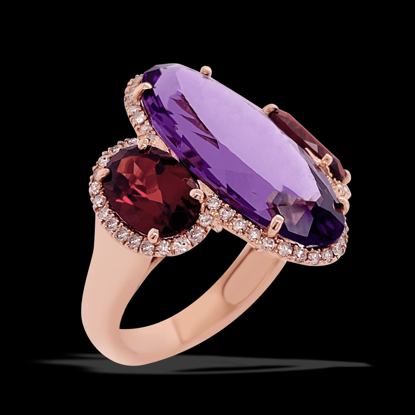 Amethyst, Garnet and diamond set Rose gold ring.