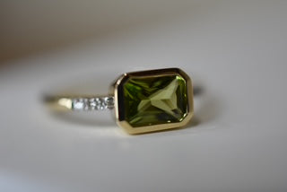 Peridot and diamond set ring
