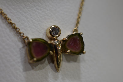 Tourmaline and diamond set butterfly pendant and chain