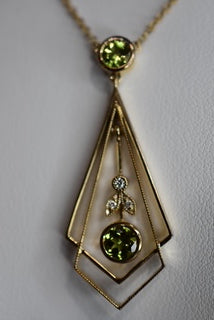 9ct yellow gold Peridot & Diamond pendant and chain.