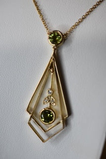 9ct yellow gold Peridot & Diamond pendant and chain.