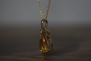 Citrine pendant with diamond