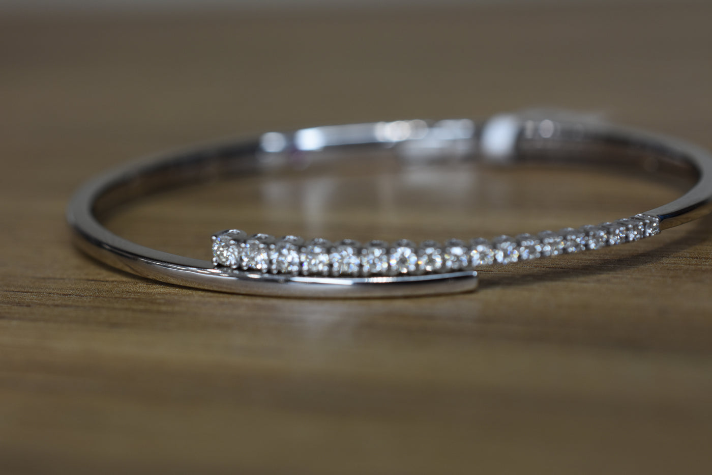 14ct white gold, diamond set open bangle.