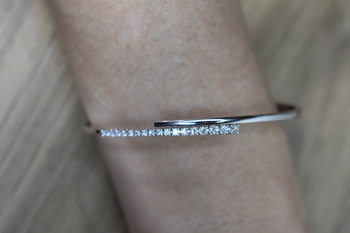 14ct white gold, diamond set open bangle.