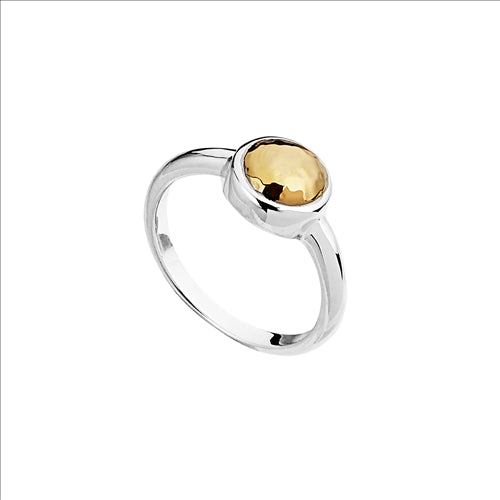 Silver, beaten yellow coloured domed disc ring