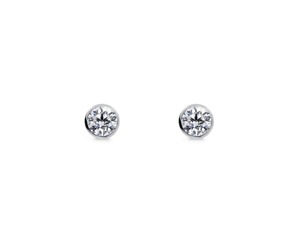 Sterling silver, cubic zirconia, bezel set studs.